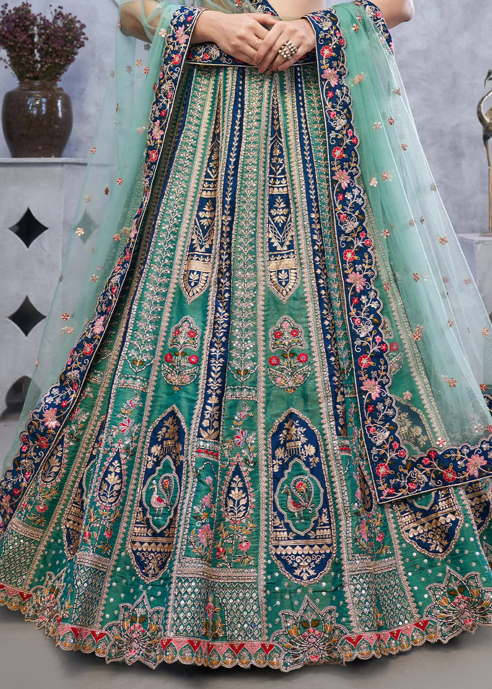 Jade Green Lehenga Choli with Intricate Paisley Designs and Embroidery on Organza Silk