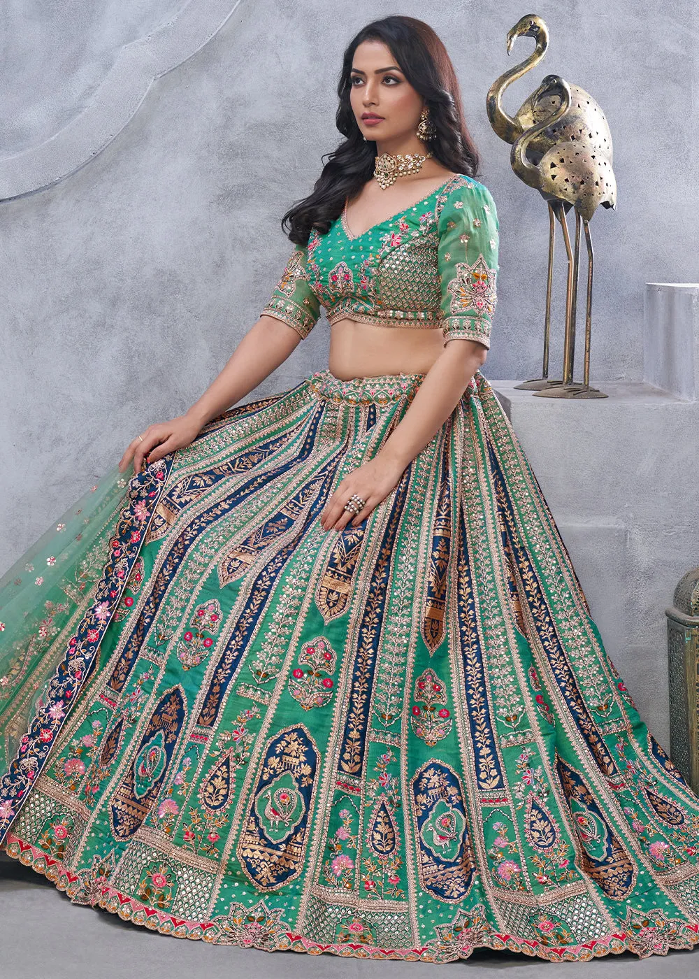 Jade Green Lehenga Choli with Intricate Paisley Designs and Embroidery on Organza Silk