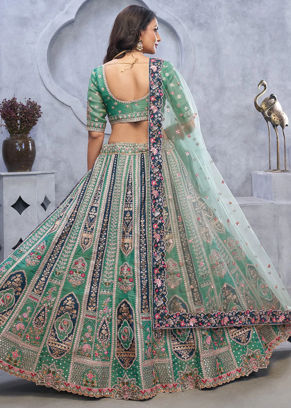 Jade Green Lehenga Choli with Intricate Paisley Designs and Embroidery on Organza Silk